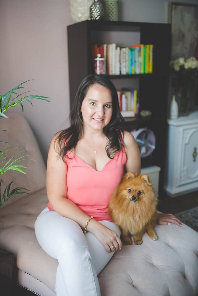 Stefani, the Founder of Inflo HR Ltd. with the office dog Gizmo